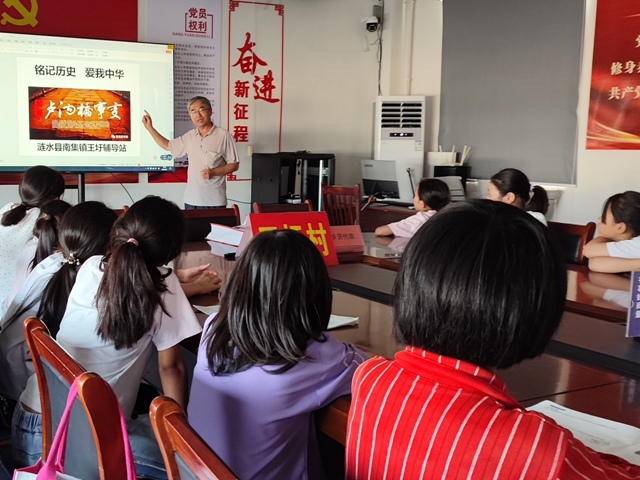 南集镇：举行“铭记历史 爱我中华”主题教育.jpg